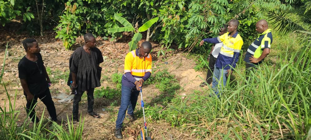 ARC team carrying out right-of-way survey work with the community